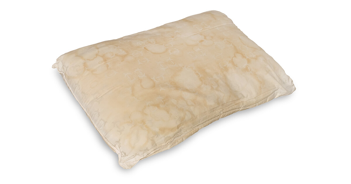 remove sweat stains from pillowcases